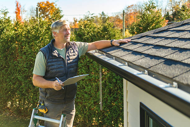 Professional Roof Replacement technician working in Hawk Run, PA